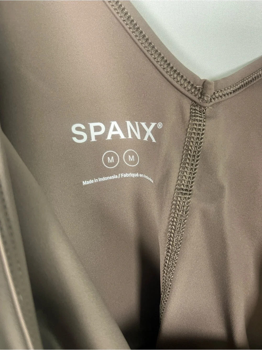 Spanx NWT booty boost deep dive stretch v neck jumpsuit athleisure sz m